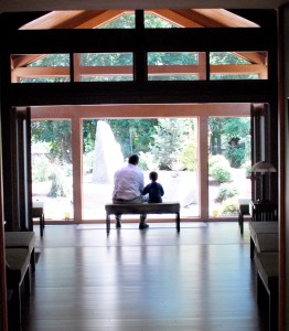 father and son in reflection room